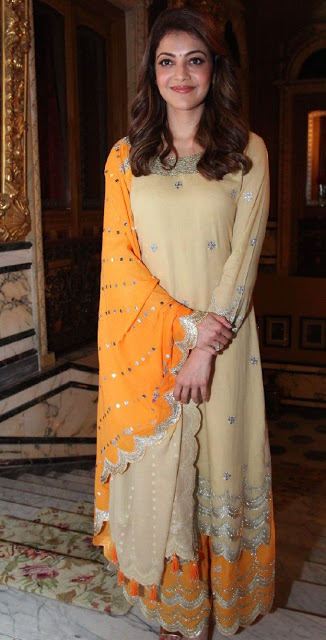 Kajal Aggarwal Stills In Yellow Dress Looking Cute 10